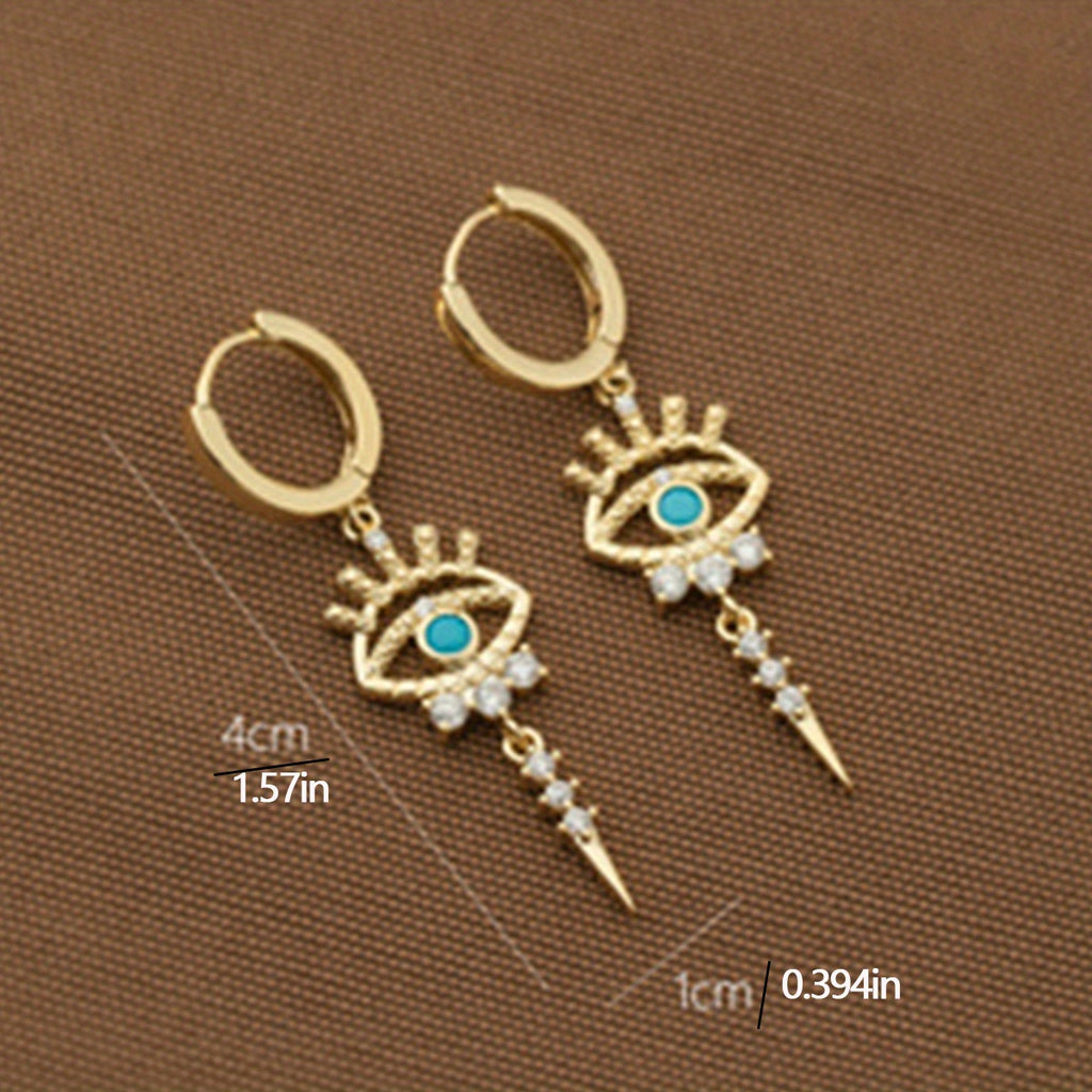 boucles d'oreilles pendantes motifs oeil