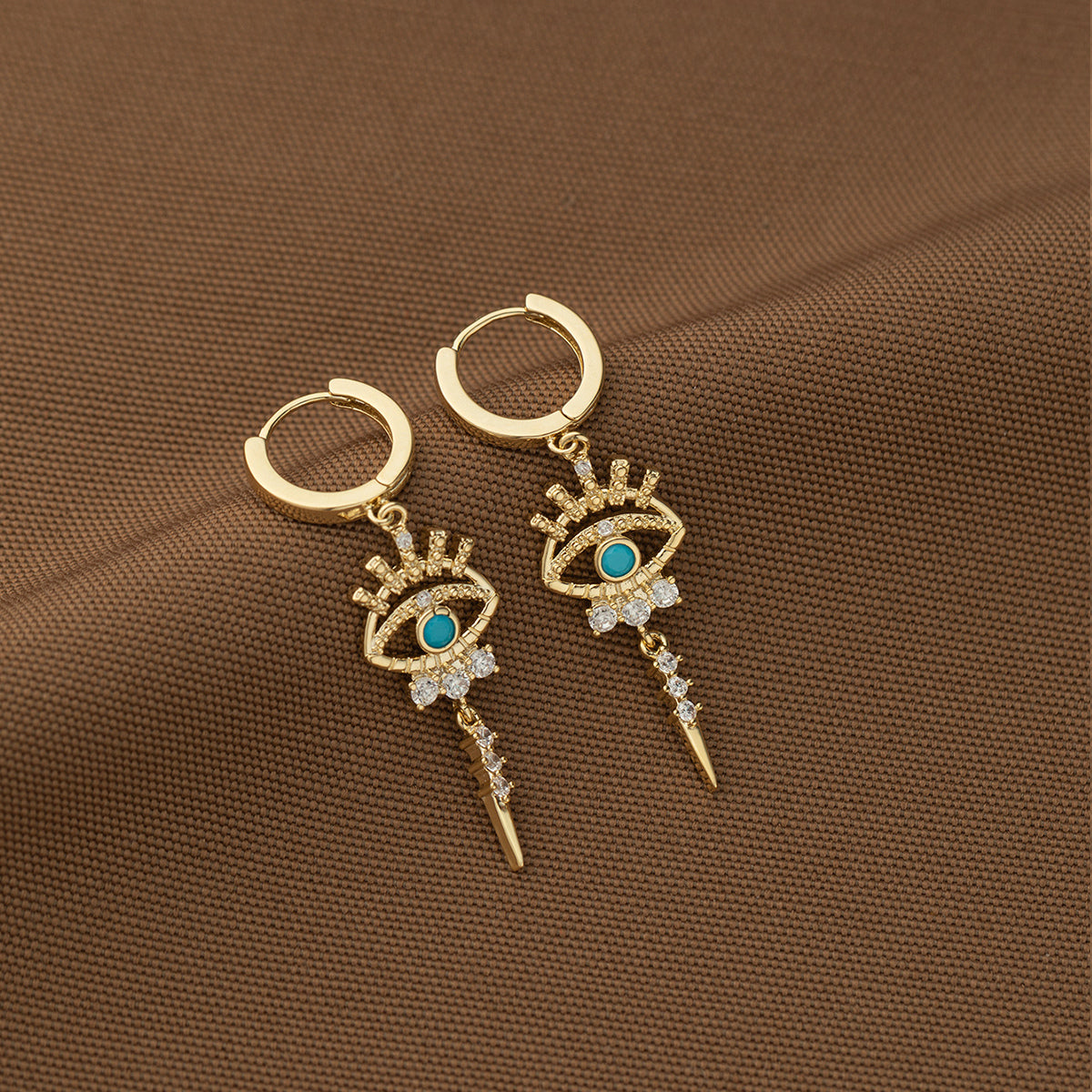 boucles d'oreilles pendantes motifs oeil