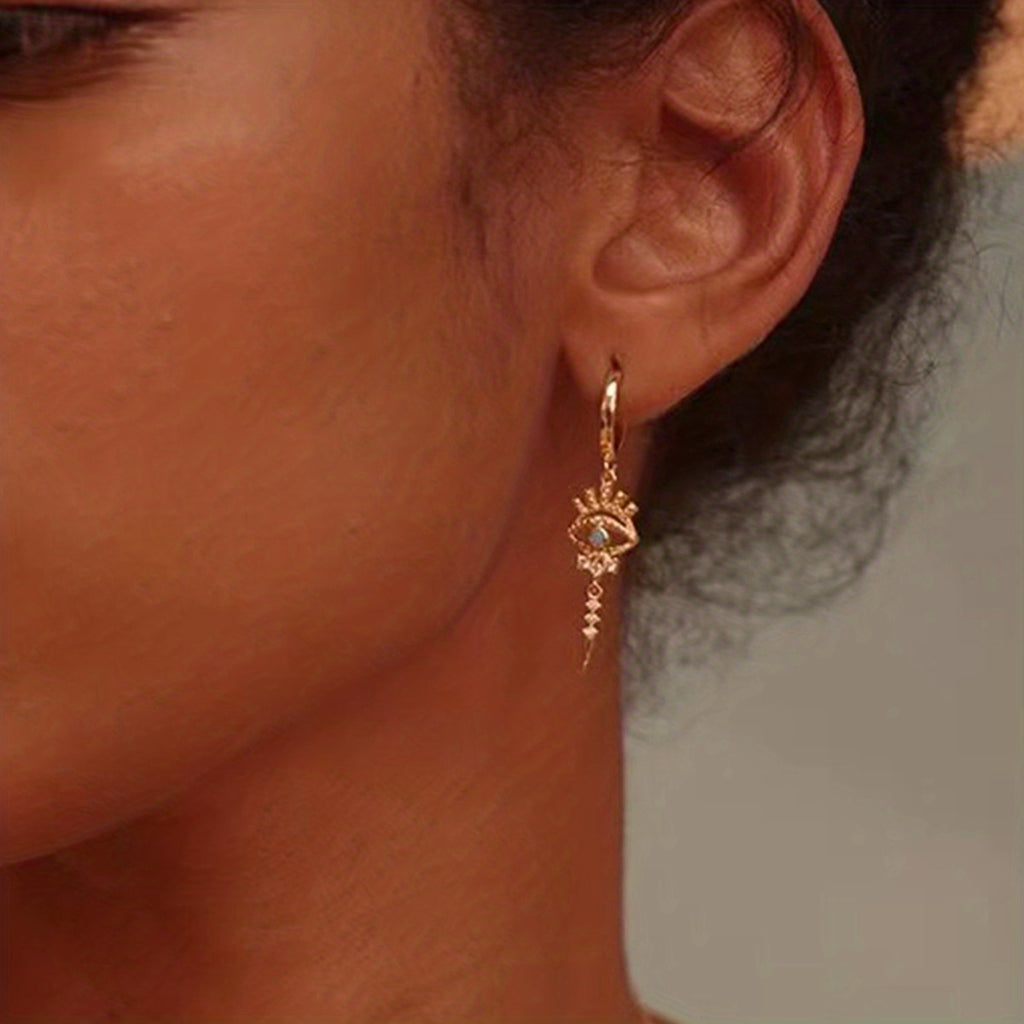 boucles d'oreilles pendantes motifs oeil