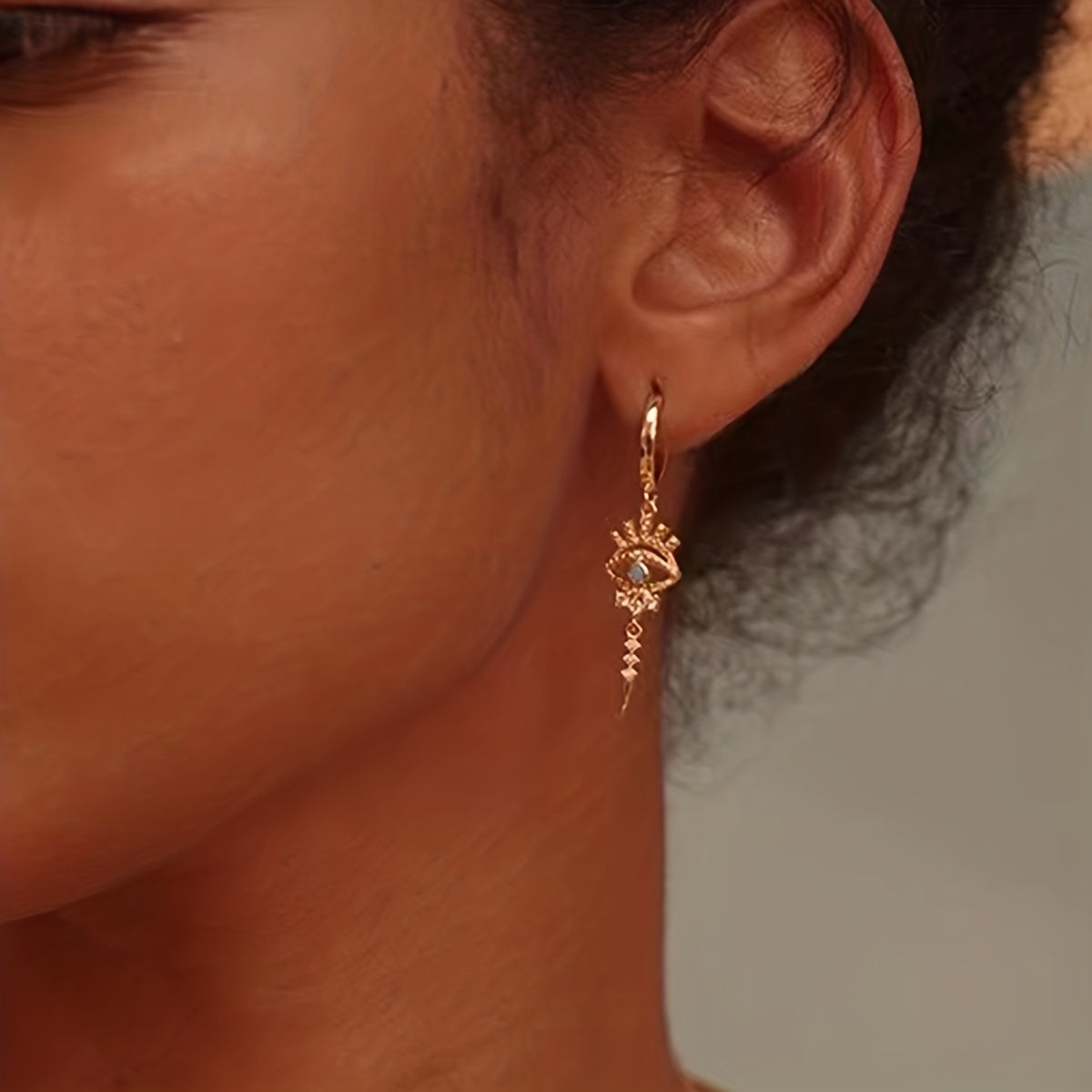 boucles d'oreilles pendantes motifs oeil