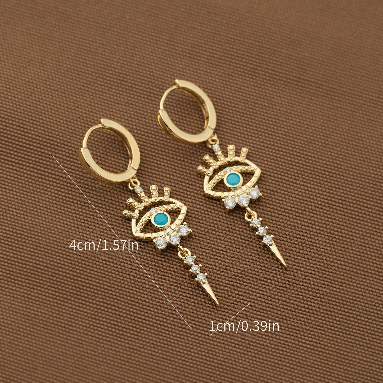 boucles d'oreilles pendantes motifs oeil